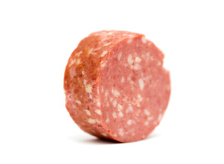 Slice sausage on a white background
