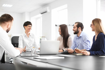 Office employees having meeting in conference room. Finance trading