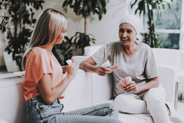 Cancer. Woman with Mother. Remission. Clinic.