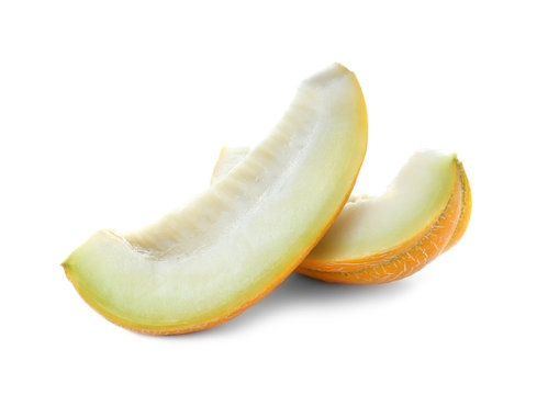 Slices of tasty ripe melon on white background