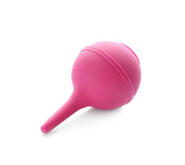 Pink enema on white background. Medical treatment