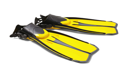 Fototapeta premium Pair of yellow flippers on white background