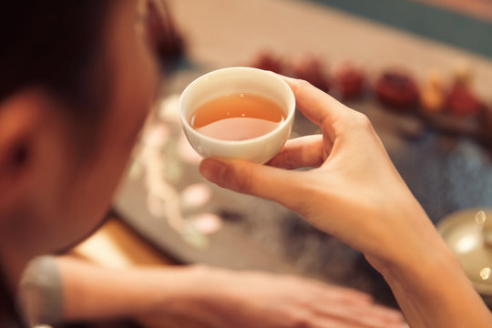 Young women drinking tea