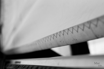 close um stitches sail