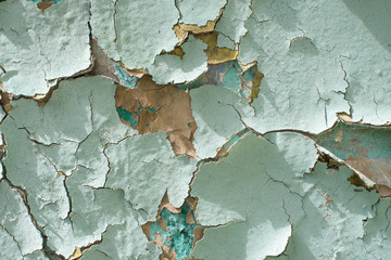 Close-up detail of cracked paint on wall.