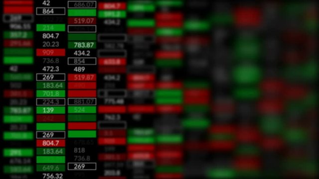 The point of focusing on the stock market screen.Forex stock market index commodity ticker board news line on black background.