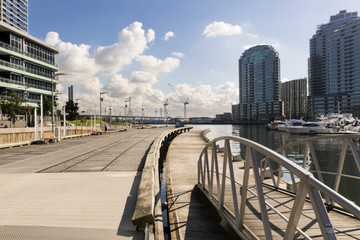 Docklands, Melbourne, Victoria, Australia. Waterfront buildings and marina, water and glass...
