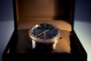 Luxury mens wristwatch displayed and packaged in a box