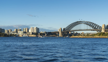 Obraz premium Sydney Harbour with Bridge and North Sydney viewed from Balmain on a sunny afternoon