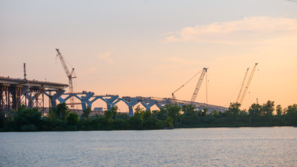 Major bridge construction site at the golden hour, Montreal, quebec, Canada.