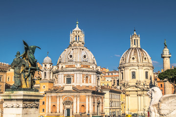 Fototapeta na wymiar The Two Domes of the Church Santa Maria di Loreto in Rome, Italy