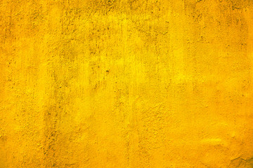 Yellow dyed wall texture  background. Plastered  and dyed wall surface.