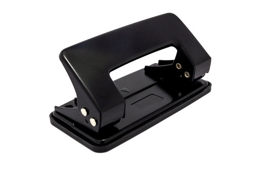 Black paper hole puncher, office tool equipment that is used to create holes in sheets of paper, isolated on a white background, with clipping path