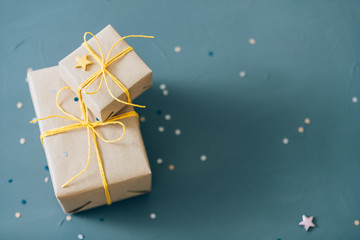 compliment gifts. holiday celebration and greeting tradition concept. two small presents wrapped in...