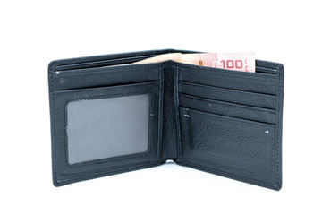 A black leather wallet rests on a white background.