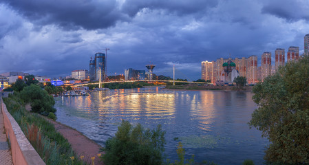 Fototapeta premium Moscow region. July 02, 2018. Panorama of the city before the rain. The embankment. Pavshinsky Bridge. Crocus City Exhibition Complex and the Government House