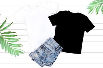 Black and White T-shirts - Flat Lay on a White Background
