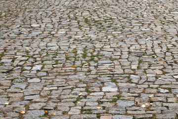 Cobblestone road with grass, background, texture