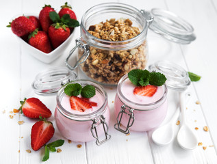 healthy breakfast, yogurt, fresh strawberries and granola