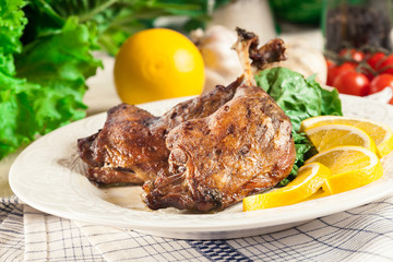 Duck legs confit with orange and salad