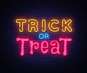 Trick or Treat neon text vector design template. Trick or Treat neon logo, light banner design element colorful modern design trend, night bright advertising, bright sign. Vector illustration