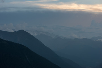 Fototapeta premium Cloudy sunset in the mountains of Valle de Aran