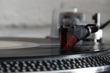 Fototapeta na wymiar Vinyl record with needle on turntable