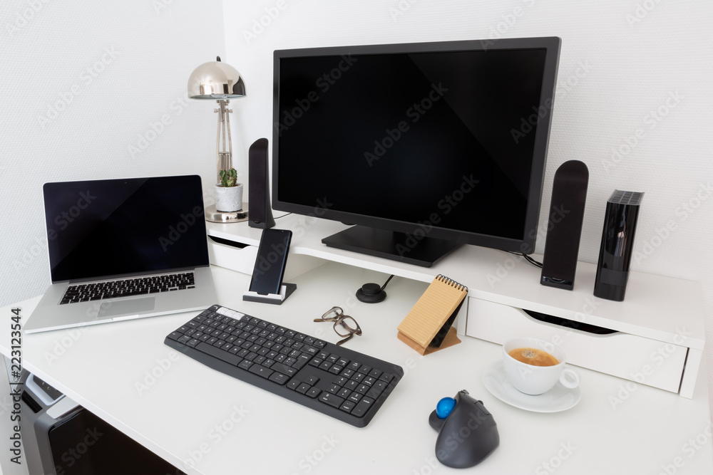 Poster computer and devices on modern white desk interior 3d rendering