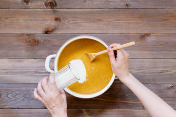 Ingredients for traditional gingerbread on the rustic wooden table