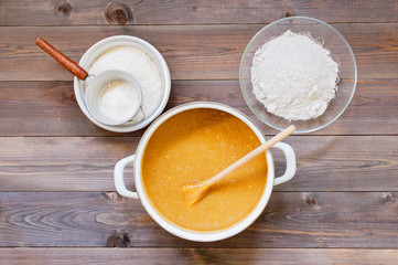 Ingredients for traditional gingerbread on the rustic wooden table
