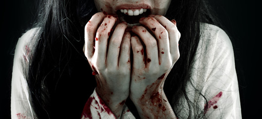 Halloween horror. Crazy bloody scary zombie woman - obrazy, fototapety, plakaty