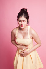 Young Asian woman got stomachache.