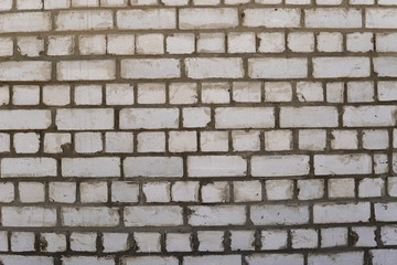 Fototapeta premium Wall of white old brick. Backgrounds, texture