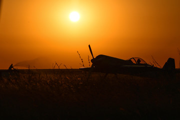 Fototapeta na wymiar airplane in sunset