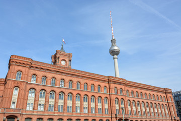 Berlin red town hall with the Berlin television tower in the background