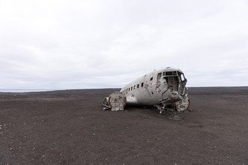 Plane wreck in Iceland at a cloudy day with no people