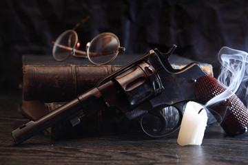 Old Revolver Near Book