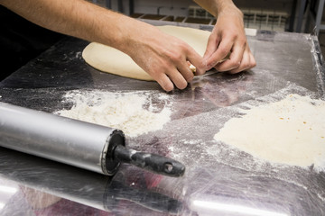 cooking pizza chef in the kitchen
