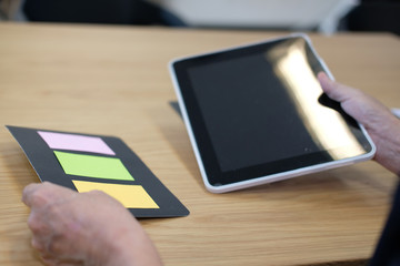 user experience workspace. UX designer desk with tablet layout. UI planning mobile application.