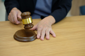 judge holding legal law gavel at courtroom. lawyer attorney justice