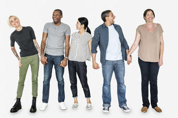 Obraz premium Diverse happy people holding hands