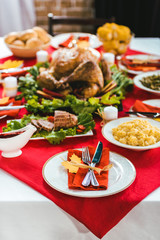 Fototapeta na wymiar beautiful thanksgiving table with various tasty dishes