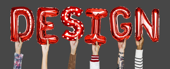 Red alphabet helium balloons forming the text design