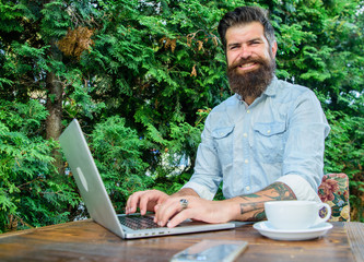 Blogger create post while enjoy coffee. Create content for web blog. Man bearded manager...