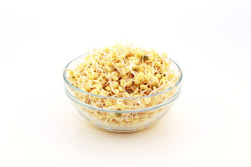 Sprouted beans on a white background. National Asian cuisine, preparation for salad, vegetarianism or raw food. Food background.