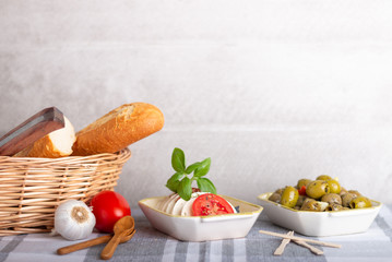 mozzarella with tomatoes and olives