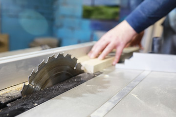 Workshop with tools and electric saws in the process