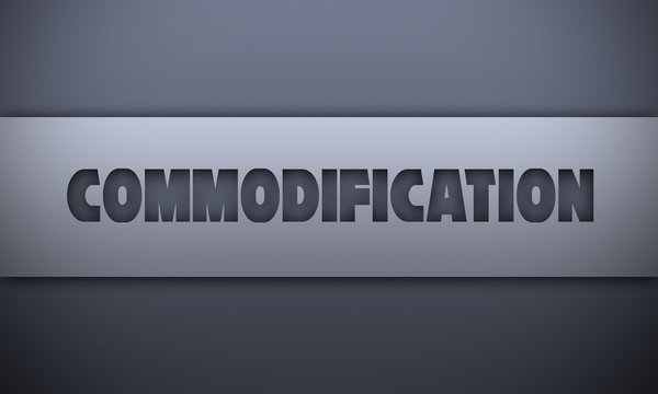 commodification - word on silver background