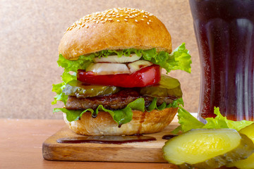 Burger on a wooden board