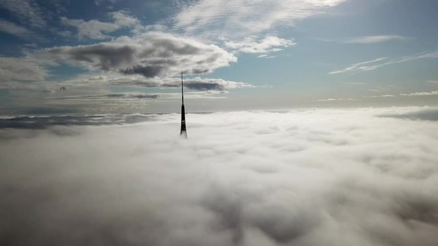 Riga Latvia Tv Tower Zakusala smoke clouds Europe biggest Aerial drone top view 